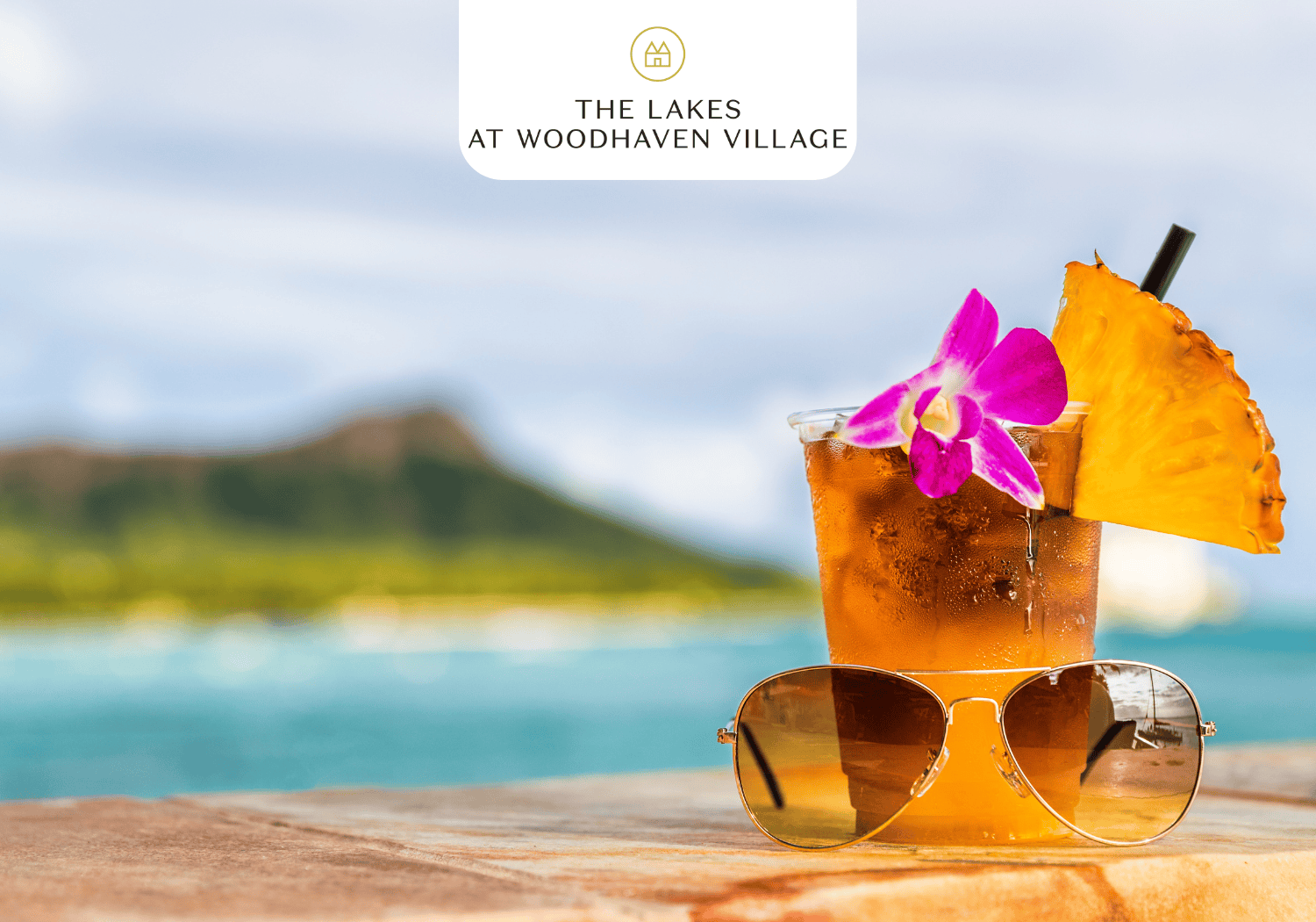 The Lakes at Woodhaven Village - Luau Party - Lakes at Woodhaven Drink on table with an island background